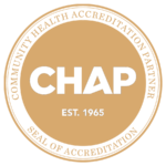 The image shows a circular logo with a light brown background and the word  CHAP  in white uppercase letters.